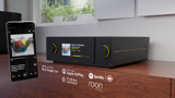 ARCAM Radia speaker met mobiel mockup toont streamingdiensten